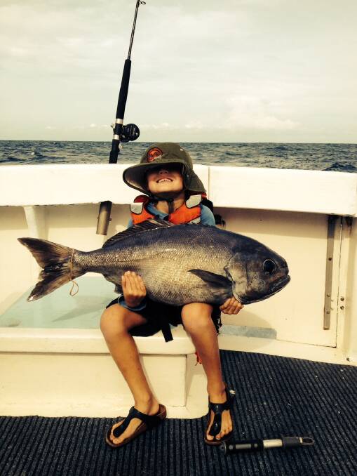 BIG BLUE: Hunter McDonald and his 12kg blue eye cod caught at the Bunga Canyons last week. 