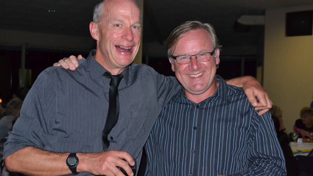 DINNER DUDES: Committee members Chris Spurgeon and Chris Westoll had a great time at the Narooma Oyster Festival dinner at the Narooma Golf Club on Saturday night. Photo Stan Gorton 