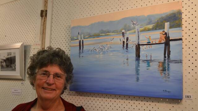 DOUBLE WINNER: Narooma artist Margaret Moran was another big winner winning two divisions at the Montague Arts and Crafts Society Easter Exhibition, including this one of a scene on Wagonga Inlet.
