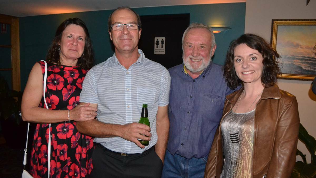 FESTIVAL SPONSORS: Debbie and Werner Gross from Narooma Betta Electrical that donated a television, Charlie Bettini of the Wagonga Princess and Mel Ricketson of The Inlet at the festival launch at The Whale on Friday. Photo Stan Gorton 