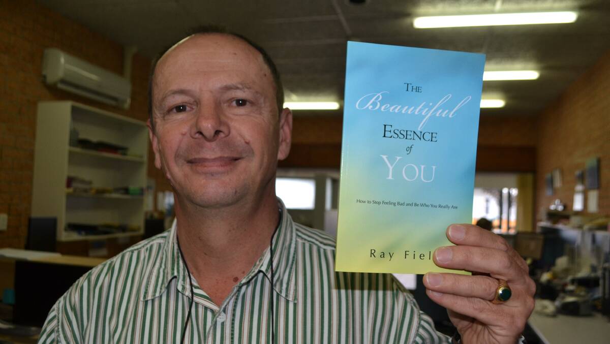 BEAUTIFUL ESSENCE: Andrew Seaton with his latest self-help book “The Beautiful Essence of You”. 