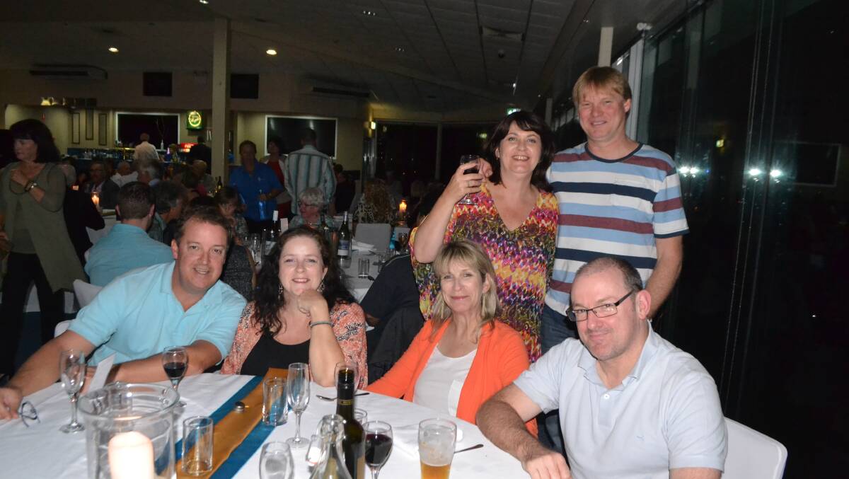 FAR WIDE: Paul Masterson, Barrine Ingram, Esmarie Ingram and James Emmerson from Sydney and Anita and Steve Barker from Perth at the Narooma Oyster Festival dinner at the Narooma Golf Club on Saturday night. Photo Stan Gorton 