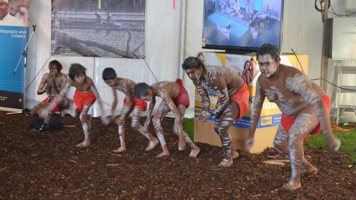 GULAGA DANCERS: The boys from the Gulaga Dancers based at Wallaga Lake and led by Warren Foster open the 2014 Narooma Oyster Festival. Photo Stan Gorton