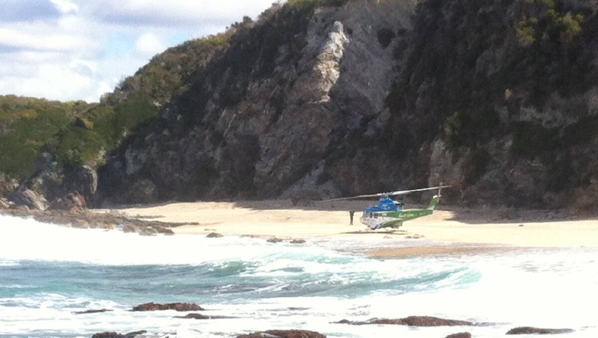 Photos from the rescue at the base of the cliffs south of Narooma