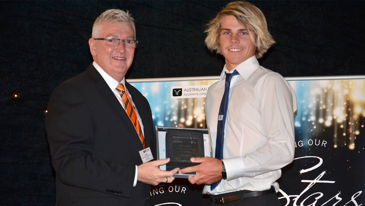 TOP STUDENT: Nicholas Cowley, who was announced at the TAFE Illawarra Institute Awards last night, as the TAFE Illawarra Student of the Year, with the sponsor of the Student of the Year award, regional manager, Southern NSW and ACT of Australian Business Apprenticeships Centre, Tony Keir. 