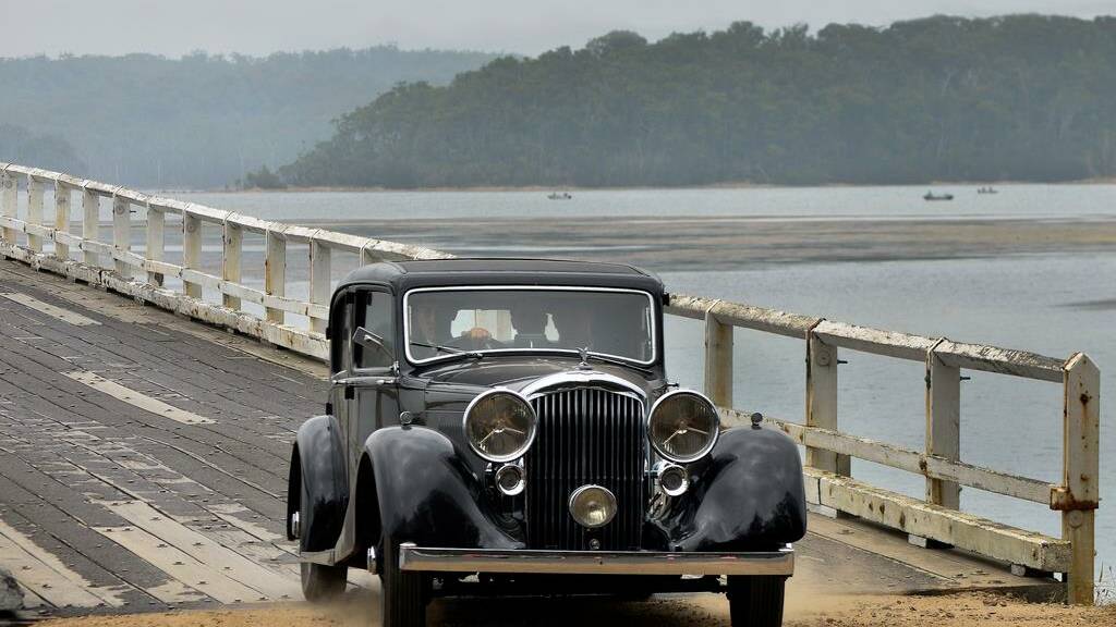 ACTION SHOT: Chilby Photography sent us this photo of the classic Bentley car racing across Wallaga Lake bridge. 