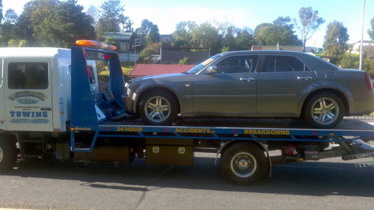 TOWED: The speeding Chrysler 300C sedan was towed away after having its licence plates removed. 