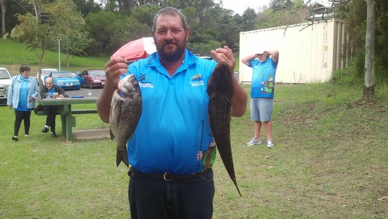 ANTHONY’S CATCH: Anthony Hicks and his estuary catch of a bream and flathead at the Narooma Bolwo fishing club weigh-in. 