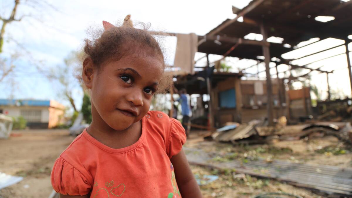 CYCLONE VICTIM: A girl at her destroyed home in Port Vila is one of many being helped by Red Cross in Vanuatu after Cyclone Pam. Photo: Hanna Butler/IFRC/NZ Red Cross 