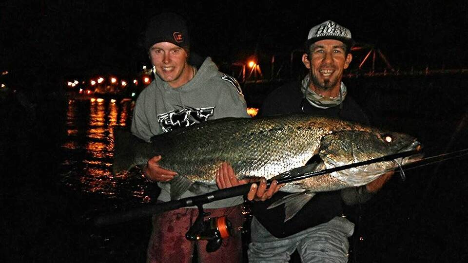 ARRRGGHHH! Wade Eaton and Joel Taylor with the massive jewfish caught near the Princess Highway Bridge at Batemans Bay. 