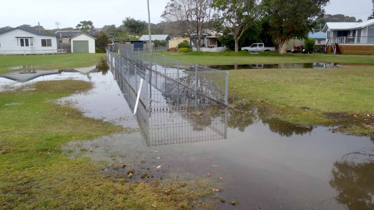KING TIDE: While council and electec official debate sea level rise standards Narooma is getting inundated during king tides such as this one back in January.