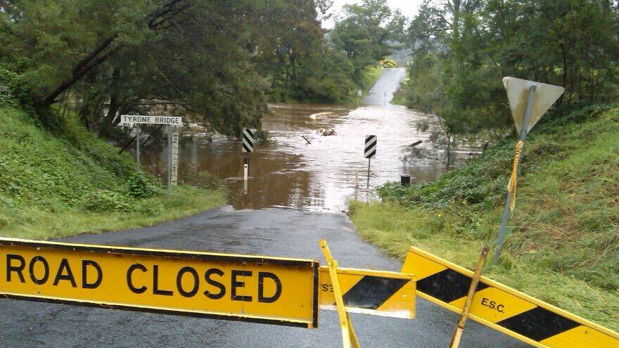 TYRONE CLOSED: Jalisa English just got these photos on Thursday morning of the Tyrone Bridge on Eurobodalla Road west of Bodalla now closed due to the overflowing Tuross River.  
