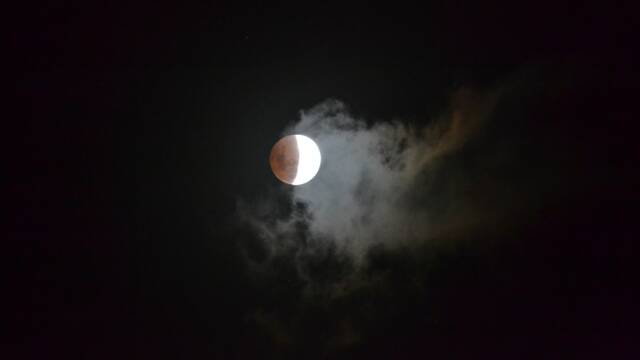 MYSTERY ECLIPSE: Narooma News editor Stan Gorton snapped the lunar eclipse at Mystery Bay south of Narooma on Tuesday night. 