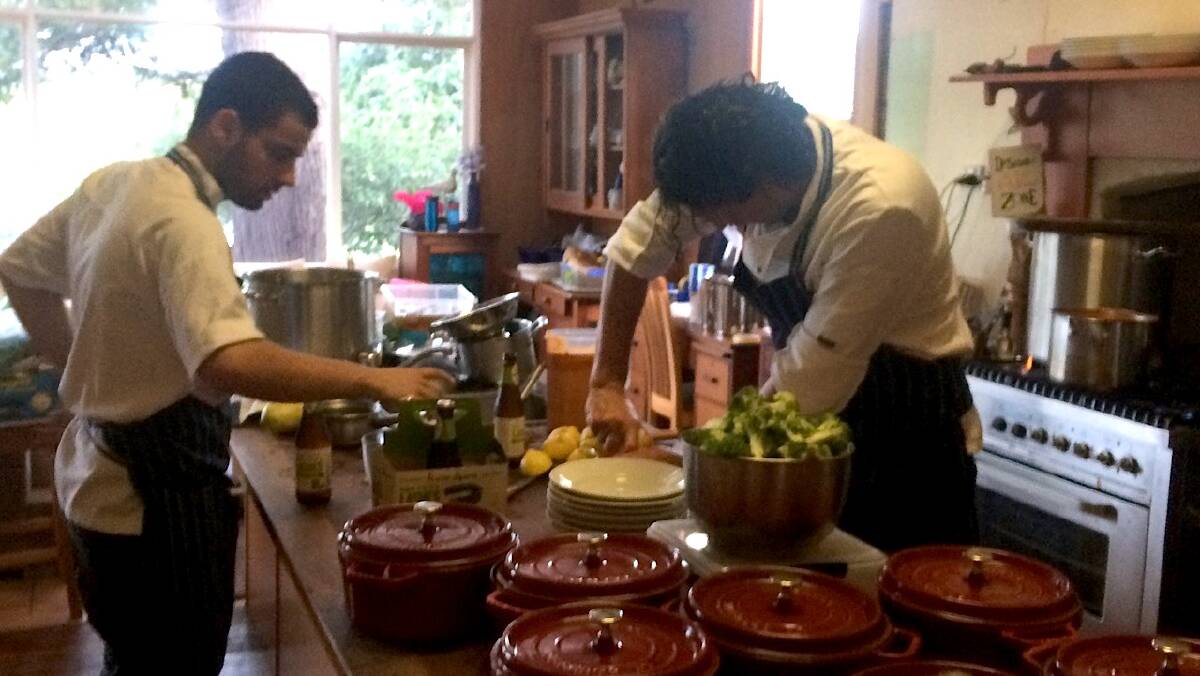 THE CHEFS: Four in Hand head chef Paul Farag and chef and restaurateur Colin Fassnidge hard at work in the Dibdens’ kitchen.