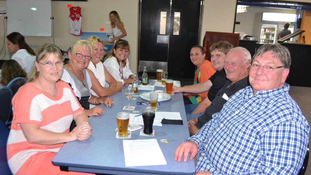 FRIENDLY TABLE: Supporting the community and Little Athletics are Tracy McDonald, Rhonda Upton, Lisa Ackerman, Lyn Murton, Moya and Bob Upton and Brian Hastie. 