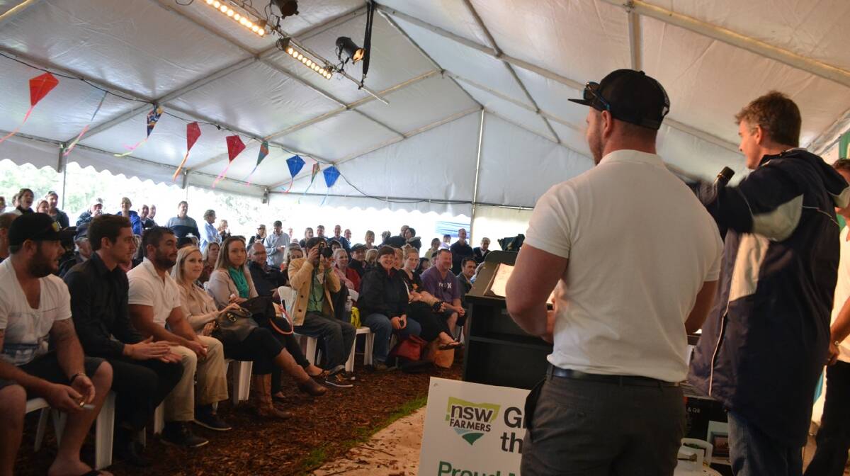 PACKED TENT: The NSW Farmers oyster shucking contest is always popular at the Narooma Oyster Festival. Photo Stan Gorton