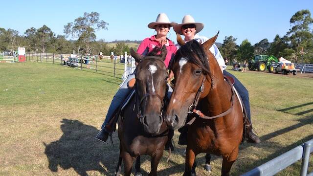 HORSE RIDERS: Horse riders at this year's Cobargo Show. National Parks wilderness areas in the region have now been opened to horse riding. 