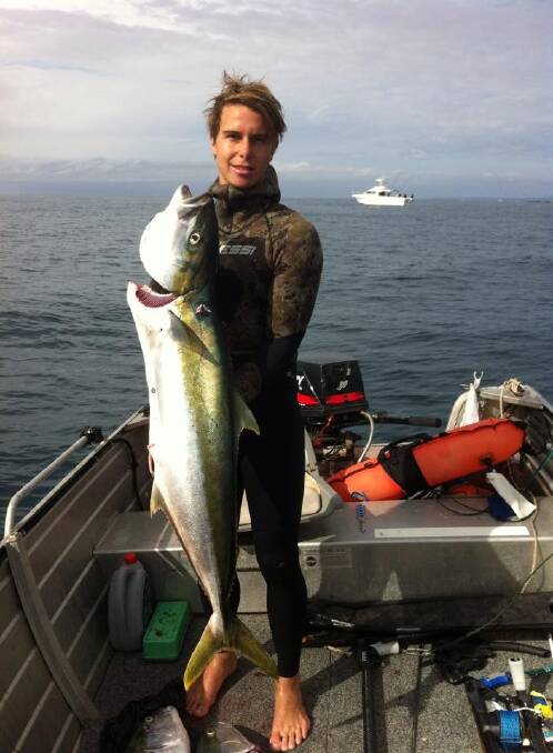MASSIVE KINGS: Young Tathra spearfisherman Jared Higgs and his mate Nathan have been at it again spearing some giant kingfish.