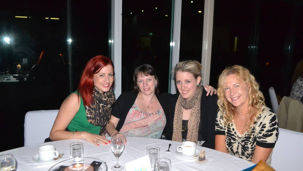 BEGA GIRLS: Bega girls and workers at the Priceline pharmacy Stacey Letton, Manda Biennand, Bron Jones and Angela Jones travelled up for the Narooma Oyster Festival dinner at the Narooma Golf Club on Saturday night. Photo Stan Gorton 