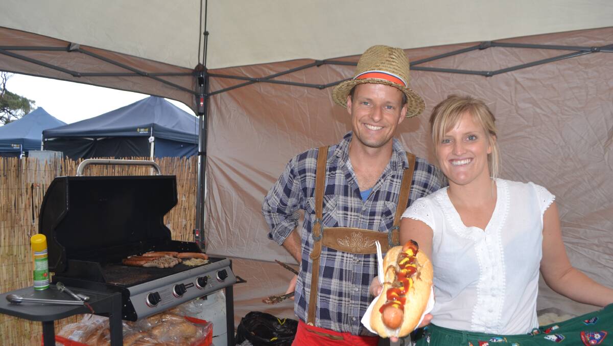 ZE GERMANS: Chris and Anika Cooper from “Ze German hut” at the Narooma Oyster Festival. Photo Stan Gorton 