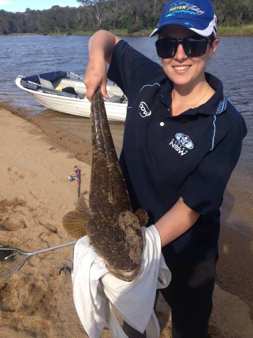 CATCH RELEASE: Kim Constable of the Bega Fishing Club also got a great flathead in the Bega River on Easter Sunday and decided to release the big girl instead of weighing her in. 