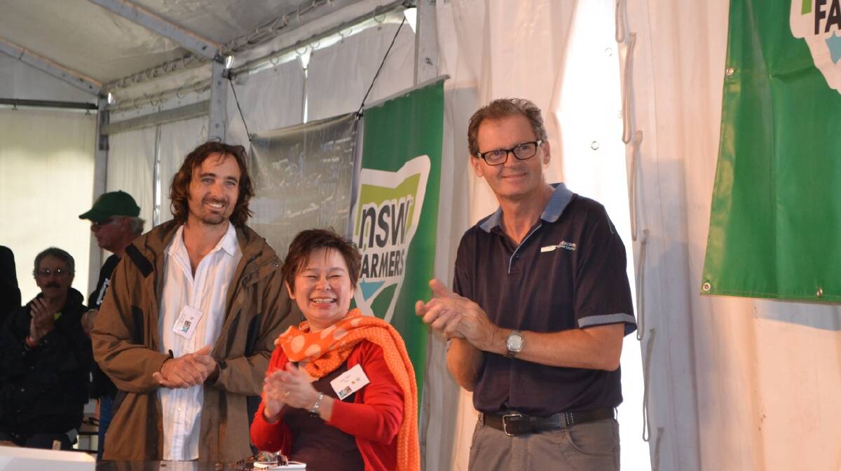 TIME KEEPERS: The time keepers in the NSW Farmers oyster shucking contest were Shoalhaven grower Leon Riepsamen, Janey Tham of 2AC radio in Sydney and Eurobodalla mayor Lindsay Brown. Photo Stan Gorton
