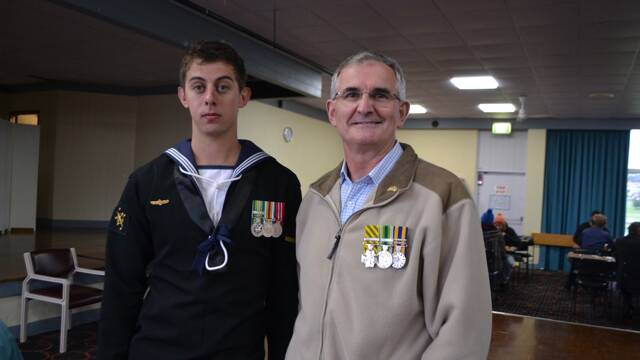 SERVING MEMBERS: Colonel Charlies Vagi of the Royal Australian Engineers is now retired and Able Seaman Benjamin Monck of Cobargo at the Gunfire Breakfast at the Bermagui Country Club. 