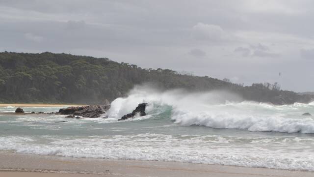 MYSTERY STORM: The current East Coast Low slams into Mystery Bay on Saturday morning causing beach erosion and putting on a show for visiting locals. Photo Stan Gorton