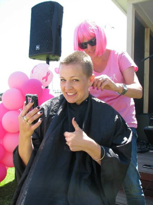COIFFED: Amy Lee Negus's new look done by hairdresser Kate Bourke raised $400 towards breast cancer awareness. "Every time you see me with my shaved head, I want you to remember to 'check your boobs'," she said. 