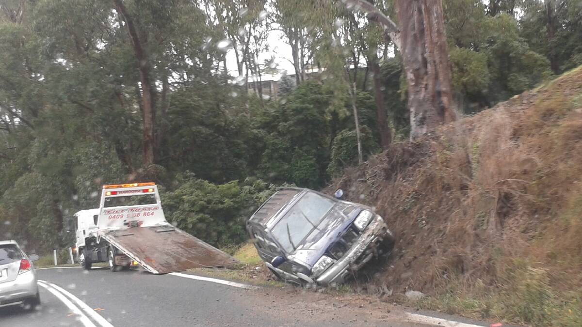 CAR ACCO: We were sent this photo of a single-vehicle accident on the Princes Highway at North Narooma on Tuesday afternoon that occurred in the wet weather. There were no injuries reported. 