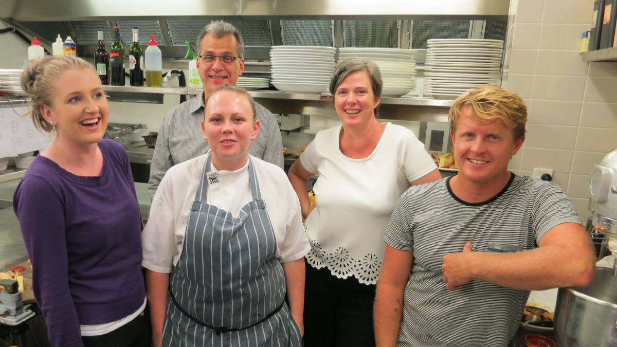WHALE TASTES: In the kitchen after the Whale's delicious Tastes of the South Coast dinner on Saturday night, part of Narooma Oyster Festival,  waitress Beth Connor, front left, chef Sarah Williams, head chef Matt Hoare, with Matt and Jen Deveson. Photo Laurelle Pacey 