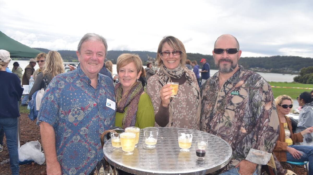 COUNCIL CREW: Eurobodalla Shire deputy mayor Neil Burnside and his wife Sally and councillor Liz Innes and her husband Spike enjoying the Narooma Oyster Festival. Photo Stan Gorton