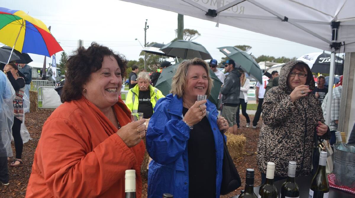 WINE TASTING: The ladies from Wollongong enjoyed the oysters and the wine at the Narooma Oyster Festival. Photo Stan Gorton