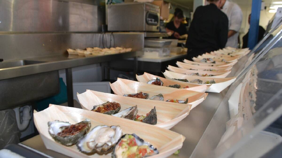 LINED UP: A selection of cooked oysters from The Inlet lined up at the Ultimate Oyster Experience at the Narooma Oyster Festival. Photo Stan Gorton