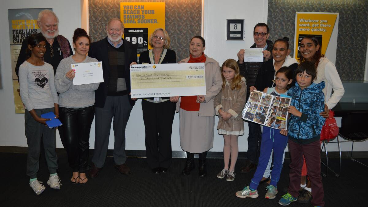 EDUCATION GRANT: Pictured at the cheque presentation from are representatives of Elm Grove Sanctuary and Wallaga study centre participants - Yurruanna Foster, Sean Burke from Elm Grove Sanctuary, Sadie Campbell, Brother Edwin Lloyd-Jones from Elm Grove Sanctuary, Commonwealth Bank representative Lesley Connor, Sister Laurel Lloyd-Jones from Elm Grove Sanctuary, Imogen de Vries, Stuart Absalom, Kerry Parsons of the Ngaardi Women’s Group, Merinda Ladmore, Reece Ladmore and Angela Parsons from, Ngaardi Women’s Group. 