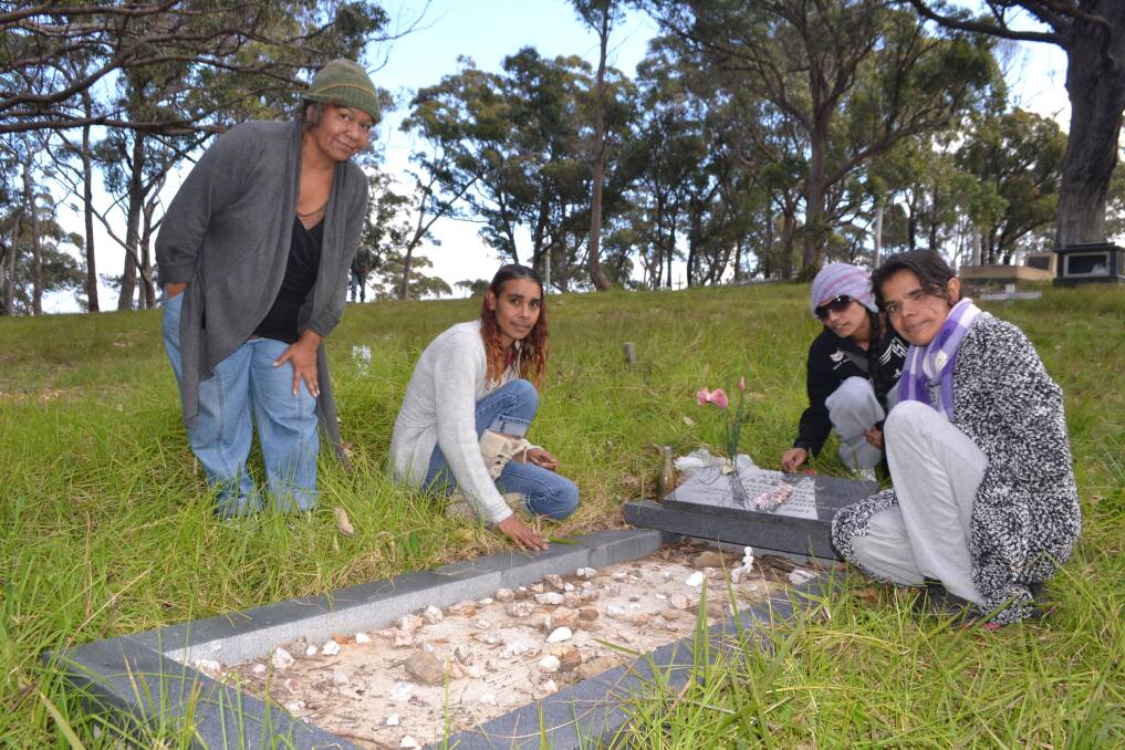 Photos of residents at the Wallaga Lake Koori village cemetery
