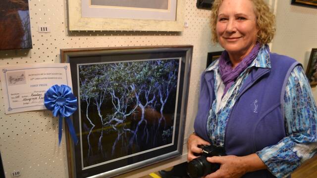 WINNING PHOTOGRAPHER: Rosy Williams of Narooma was awarded Best Photograph at the Montague Arts and Crafts Society Easter Exhibition for her work “Mangrove Dancer” taken on Wagonga Inlet.