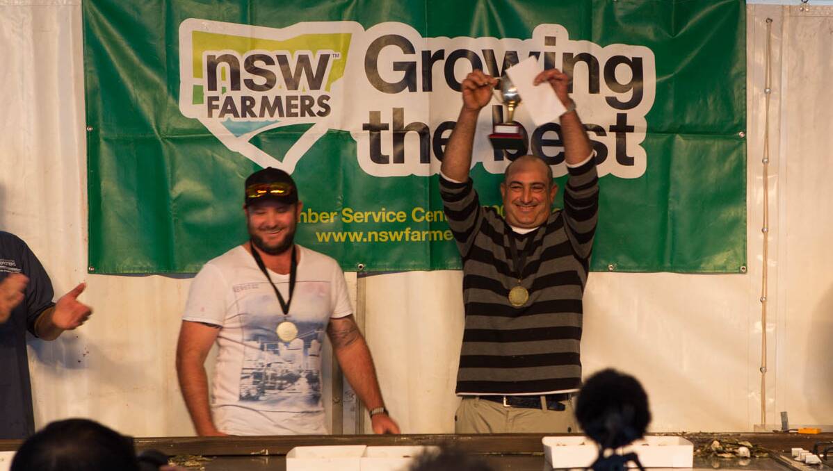 WINNER: The Narooma Oyster Festival NSW Farmers Oyster Shucking Competition was won by Batemans Bay oyster farmer Jim Yiannaros, for the second year running.
Silver medal winner was Steven Connell (left). Photo Toby Whitelaw.