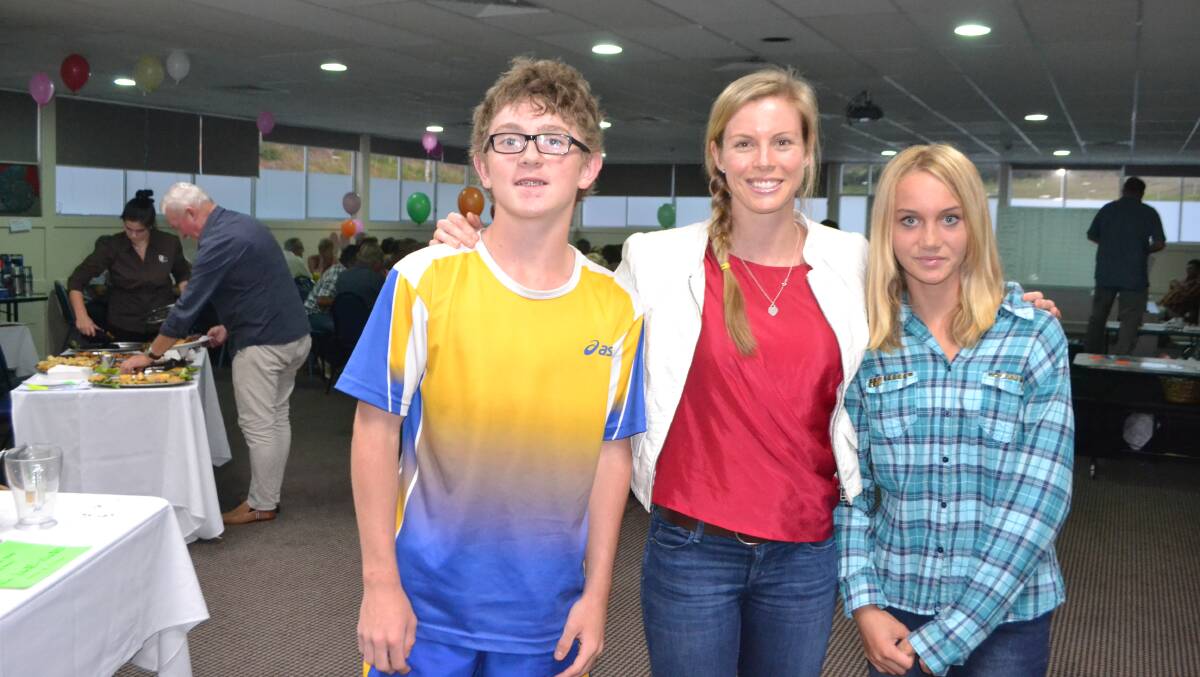 WITH MELISSA: Connor Griffiths and Lilly Bennett with former Olympic skeleton racer Melissa Hoar who like the kids got her start sprinting on Narooma surf beach. 