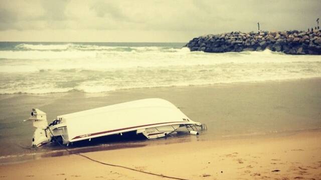 Photos of the Narooma bar boating accident