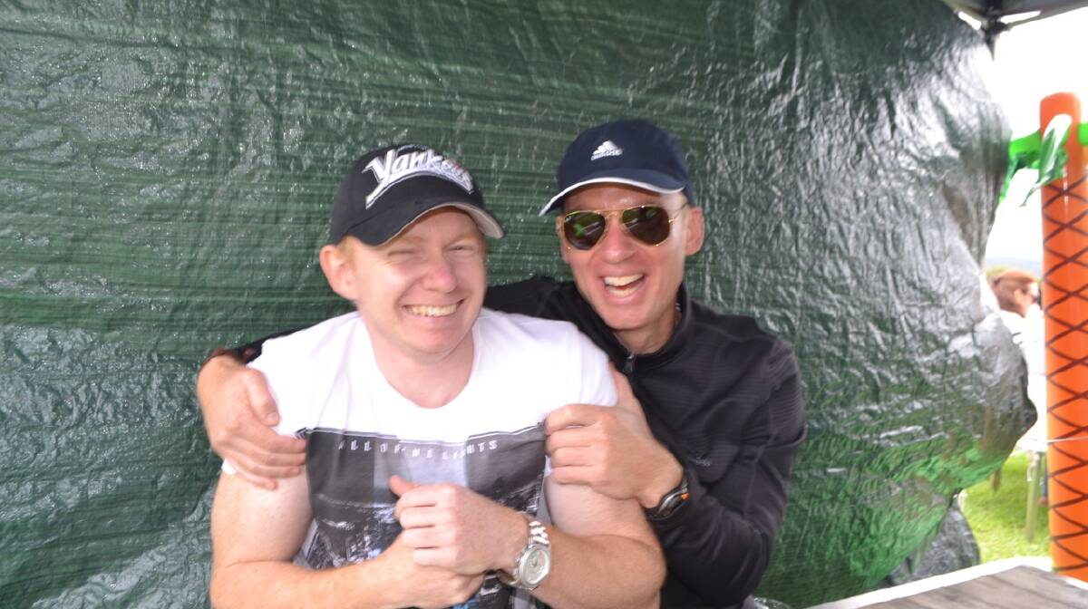 GOOD MATES: Having a fun are a couple of Canberra mates at the Oyster Oasis Lounge set up by the Ulladulla Oyster Bar at the Narooma Oyster Festival. Photo Stan Gorton