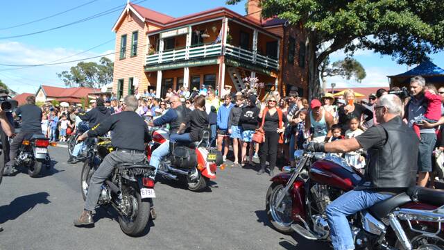 CRABS RIDE: The Bermagui chapter of the CRABS (Cancer Research Advocate Bikers) in the parade at the Tilba Festival on Easter Saturday.