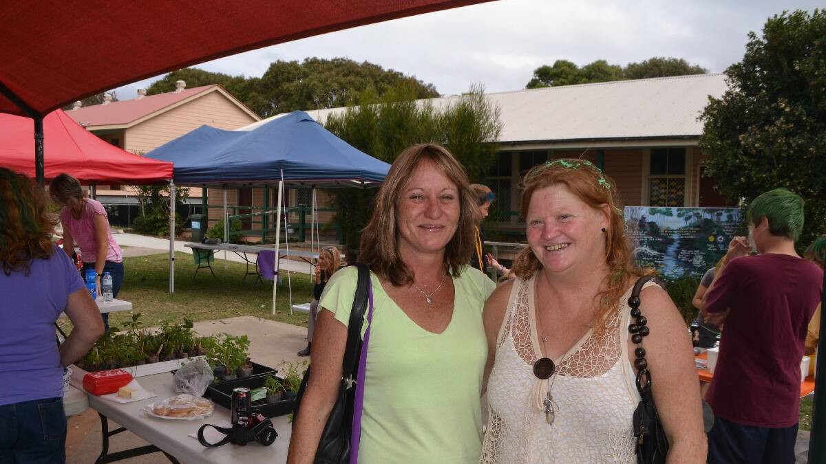 AT SCHOOL: Enjoying the Narooma Public School 125th anniversary
celebrations on Saturday are local Helen Dal Molin and Kelly Spicer
now of Maroubra.
 