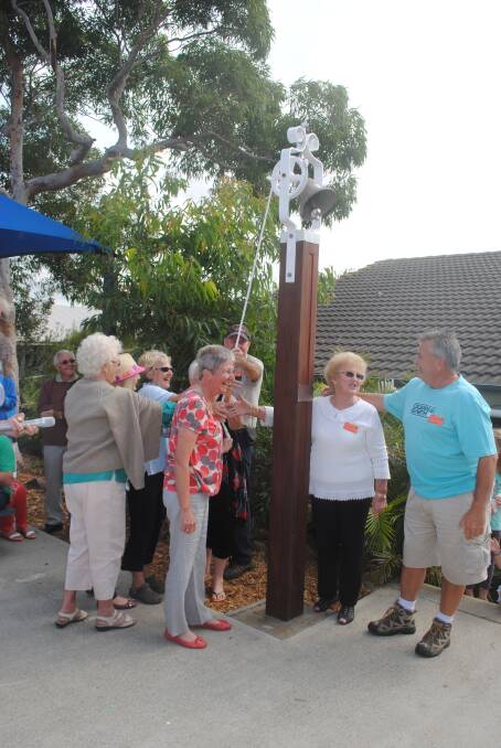 RING: The Narooma Public School 125th Anniversary Committee all ring the bell.