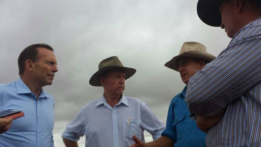 Tony Abbott and Bourke farmer Phil Ridge this morning. Photo: Grace Ryan