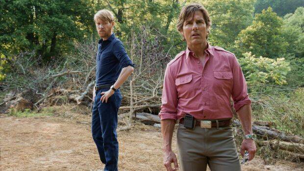 Tom Cruise with Domhnall Gleeson (left) in American Made. Photo: Universal
