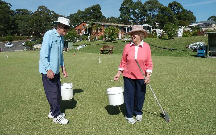 2015 CROQUET: Ken Cole and Edna Falkiner sweeping the lines of perfectly top-dressed courts; we are ready for 2015 play.   