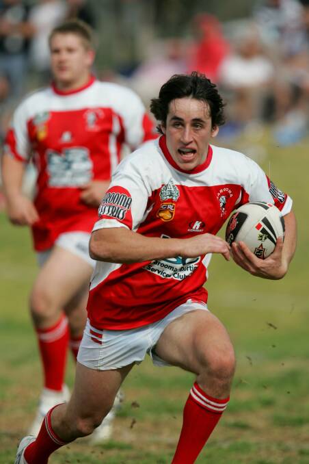 NEW COACH: The Narooma Devils first grade rugby league captain and coach Clint Wright in action during the 2009 grand final.