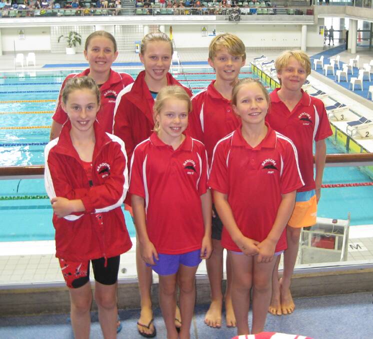 NAROOMA SWIM SQUAD: Narooma swimmers that travelled to Sydney for the 2015 Country Swimming Championships from back left Sophie O’Meara, Georgia Pendergast, Aiden Miles and Banjo King. Front from left Milaina Café, Michala Pendergast and Ruby O’Meara.