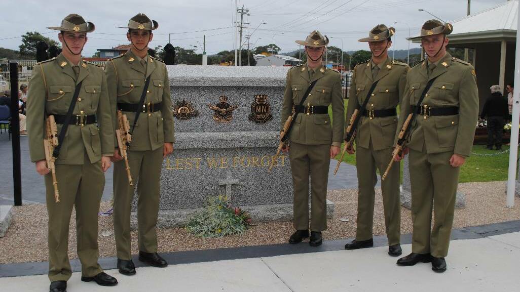 CATAFALQUE: The Narooma ANZAC Catafalque party from left OCDT Edward Wright, OCDT Cameron Coppo, OCDT Thomas Lord, OCDT Jason Vujicic and OCDT Stephen bowls from ADFA Canberra.